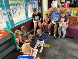Makuri School Students reading thier new books